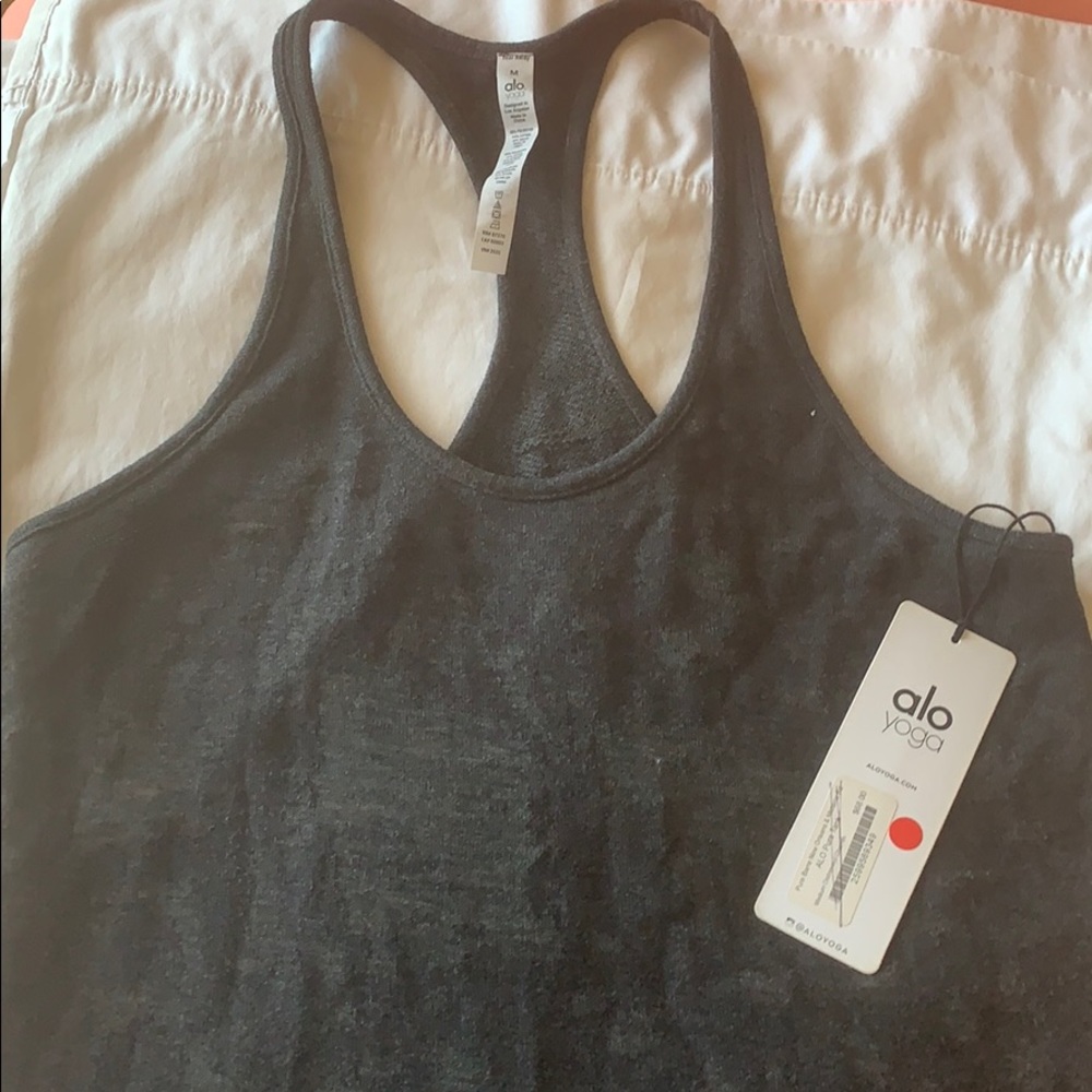 Also distressed knit tank
